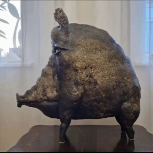Suspicious pig statue
